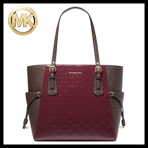 Michael Kors Handbags - MICHAEL KORS Voyager East/West Tote Merlot With Brown MK Logo